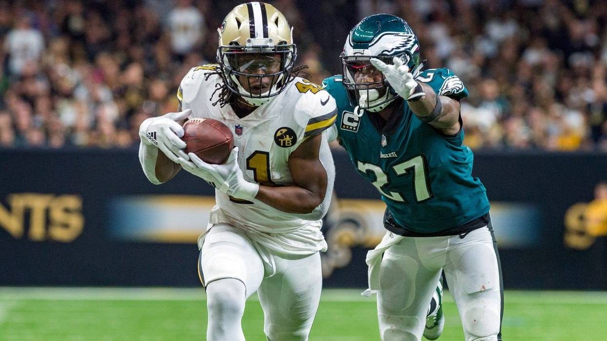 Nov 18, 2018; New Orleans, LA, USA; New Orleans Saints running back Alvin Kamara (41) runs the ball against Philadelphia Eagles strong safety Malcolm Jenkins (27) at the Mercedes-Benz Superdome