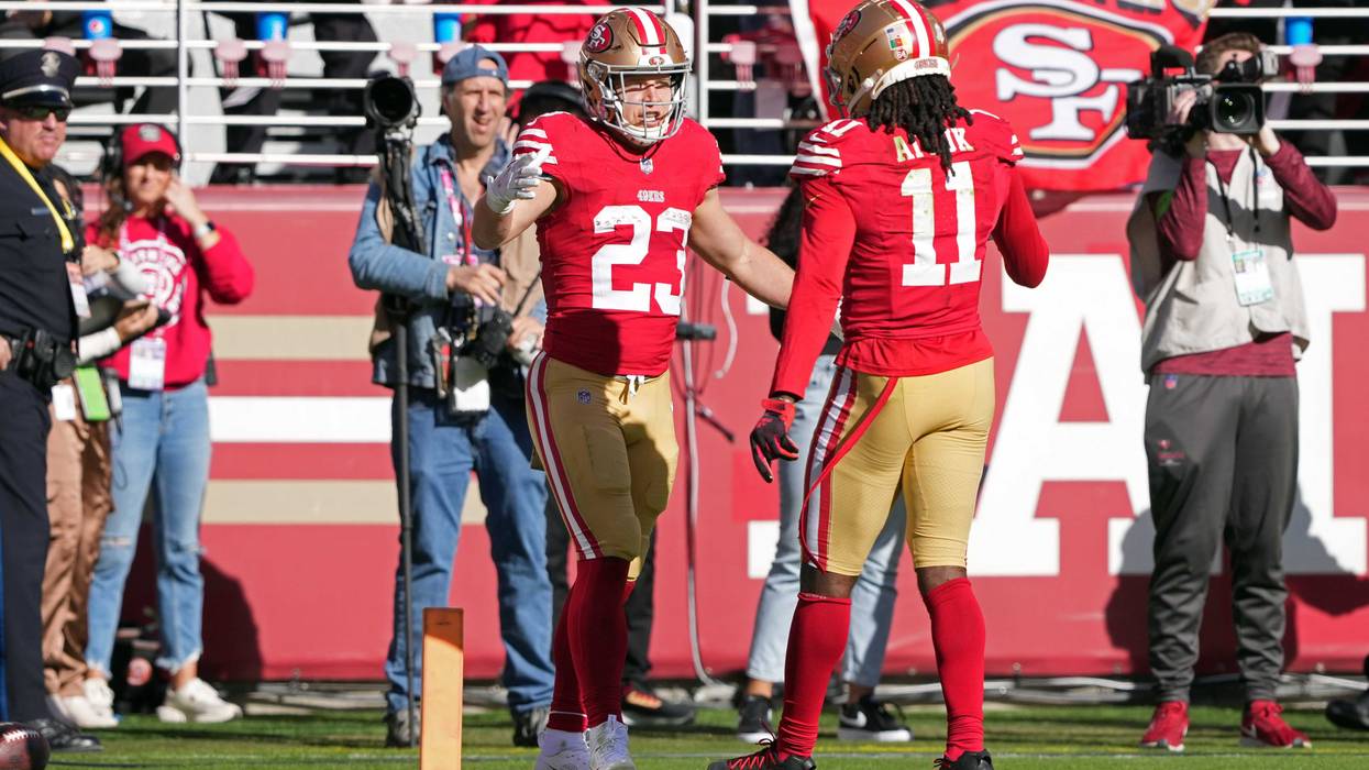 Nov 19, 2023; Santa Clara, California, USA; San Francisco 49ers running back Christian McCaffrey (23) celebrates with wide receiver Brandon Aiyuk (11) after scoring a touchdown against the Tampa Bay Buccaneers during the first quarter at Levi's Stadium