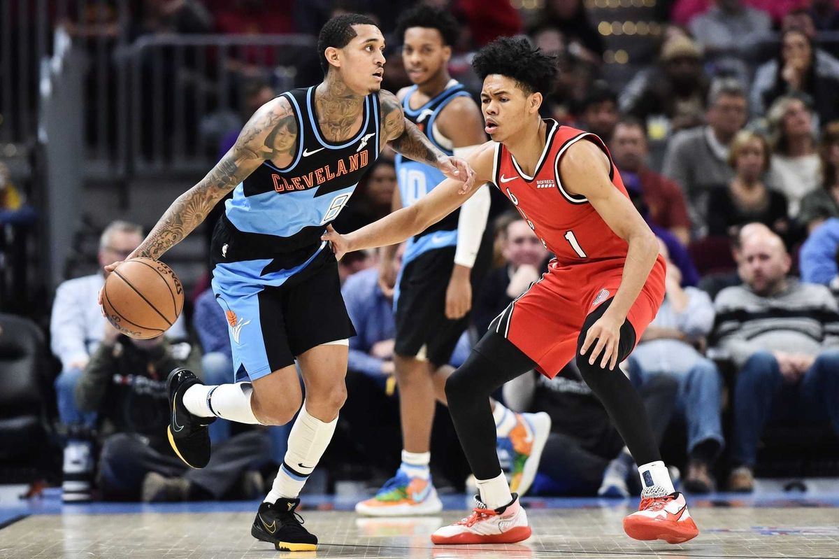 Nov 23, 2019; Cleveland, OH, USA; Portland Trail Blazers guard Anfernee Simons (1) defends Cleveland Cavaliers guard Jordan Clarkson (8) during the second half at Rocket Mortgage FieldHouse. Mandatory Credit: Ken Blaze-USA TODAY Sports
