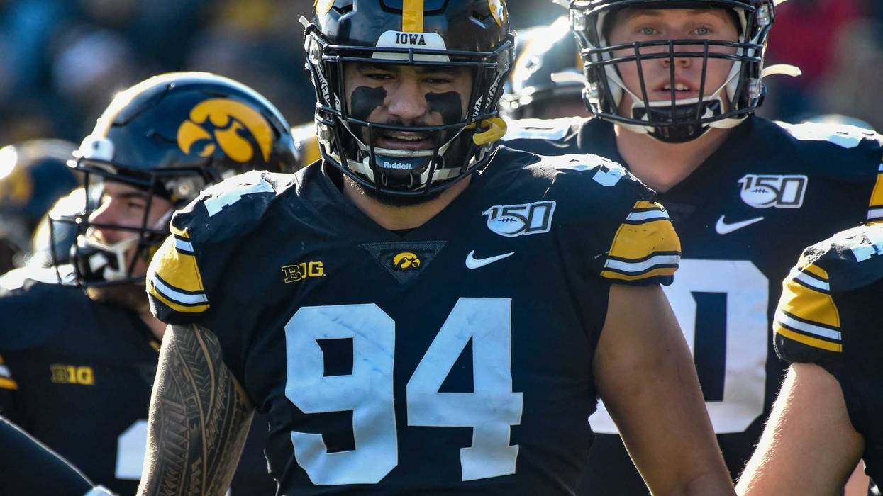 Nov 23, 2019; Iowa City, IA, USA; Iowa Hawkeyes defensive end A.J. Epenesa (94) enters the field before the game against the Illinois Fighting Illini at Kinnick Stadium. Mandatory Credit: Jeffrey Becker-USA TODAY Sports