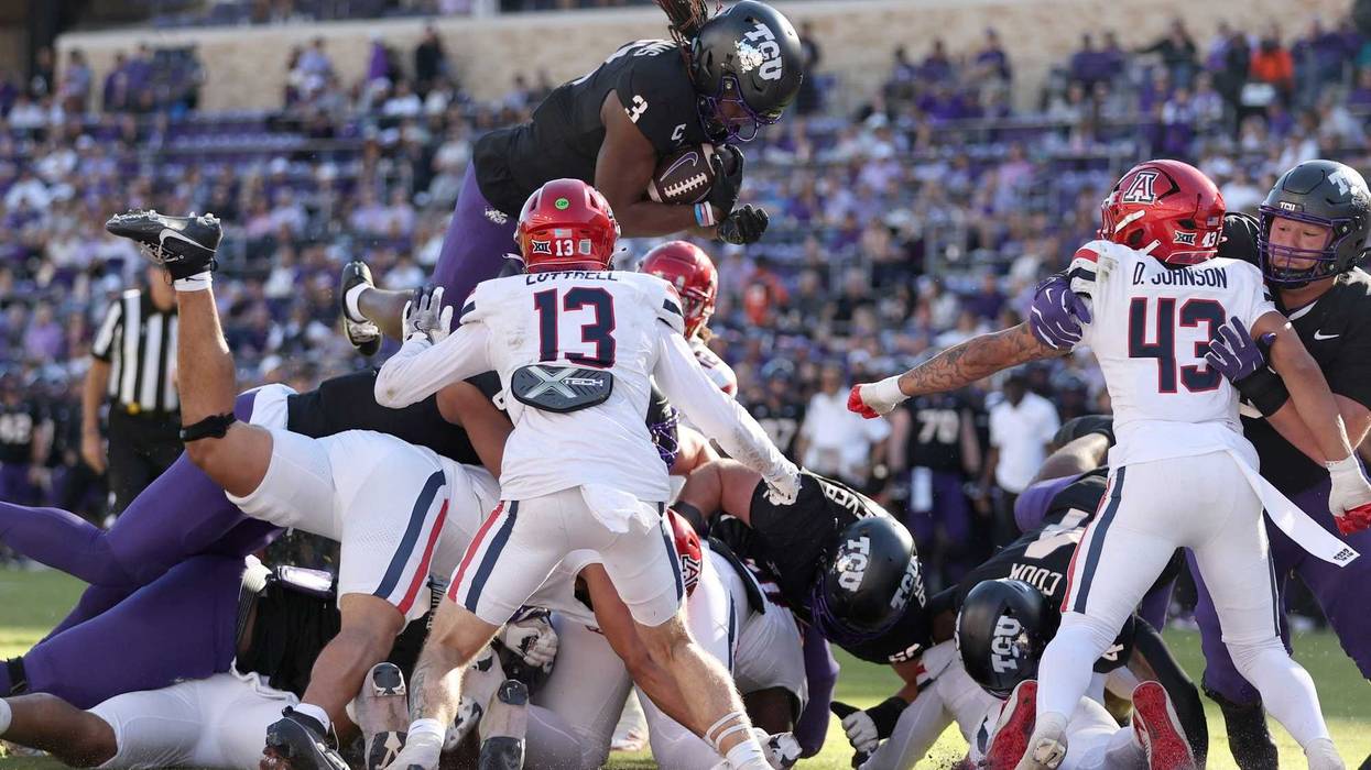 Nov 23, 2024; Fort Worth, Texas, USA; TCU Horned Frogs wide receiver Savion Williams (3) scores a touchdown against the Arizona Wildcats in the first quarter at Amon G. Carter Stadium. Mandatory Credit: Tim Heitman-Imagn Images