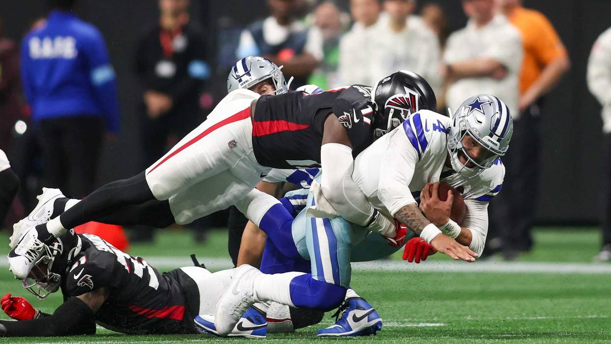 Nov 3, 2024; Atlanta, Georgia, USA; Atlanta Falcons linebacker Arnold Ebiketie (17) tackles Dallas Cowboys quarterback Dak Prescott (4) in the third quarter at Mercedes-Benz Stadium. Mandatory Credit: Brett Davis-Imagn Images