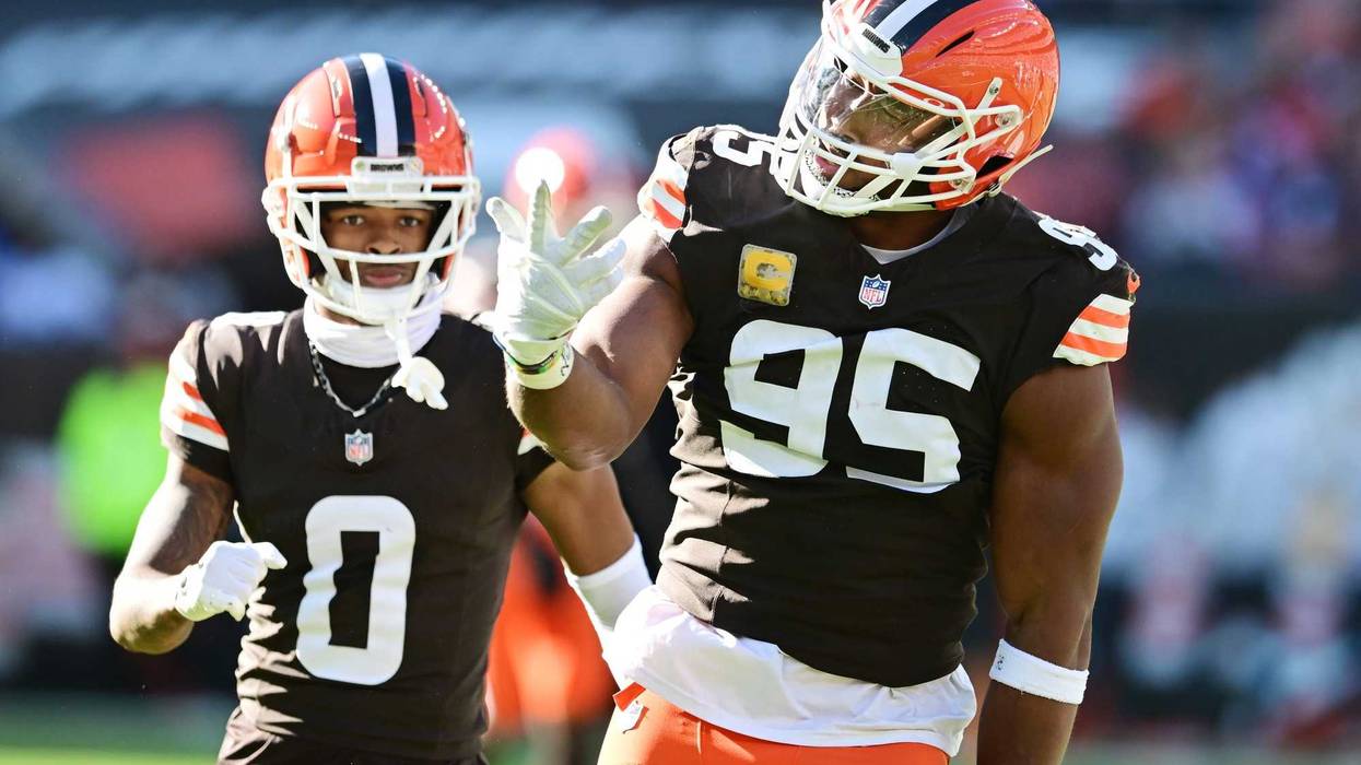 Nov 3, 2024; Cleveland, Ohio, USA; Cleveland Browns defensive end Myles Garrett (95) celebrates after sacking Los Angeles Chargers quarterback Justin Herbert (not pictured) for the third time during the first half at Huntington Bank Field.
