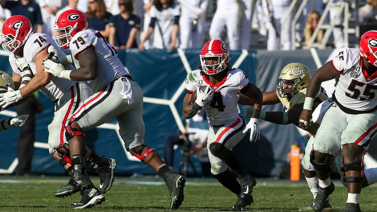 Nov 30, 2019; Atlanta, GA, USA; Georgia Bulldogs running back James Cook (4) runs the ball against the Georgia Tech Yellow Jackets in the second half at Bobby Dodd Stadium. Mandatory Credit: Brett Davis-USA TODAY Sports