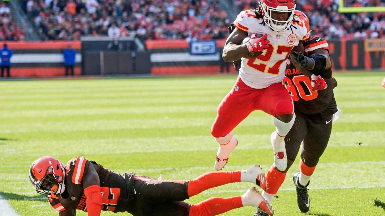 Nov 4, 2018; Cleveland, OH, USA; Kansas City Chiefs running back Kareem Hunt (27) eludes the tackle of Cleveland Browns free safety Jabrill Peppers (22) during the first half at FirstEnergy Stadium.