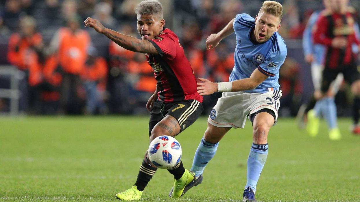Nov 4, 2018; New York, NY, USA; Atlanta United forward Josef Martinez (7) and New York City FC defender Anton Tinnerholm (3) fight for the ball during the second half at Yankee Stadium. Mandatory Credit: Brad Penner-USA TODAY Sports