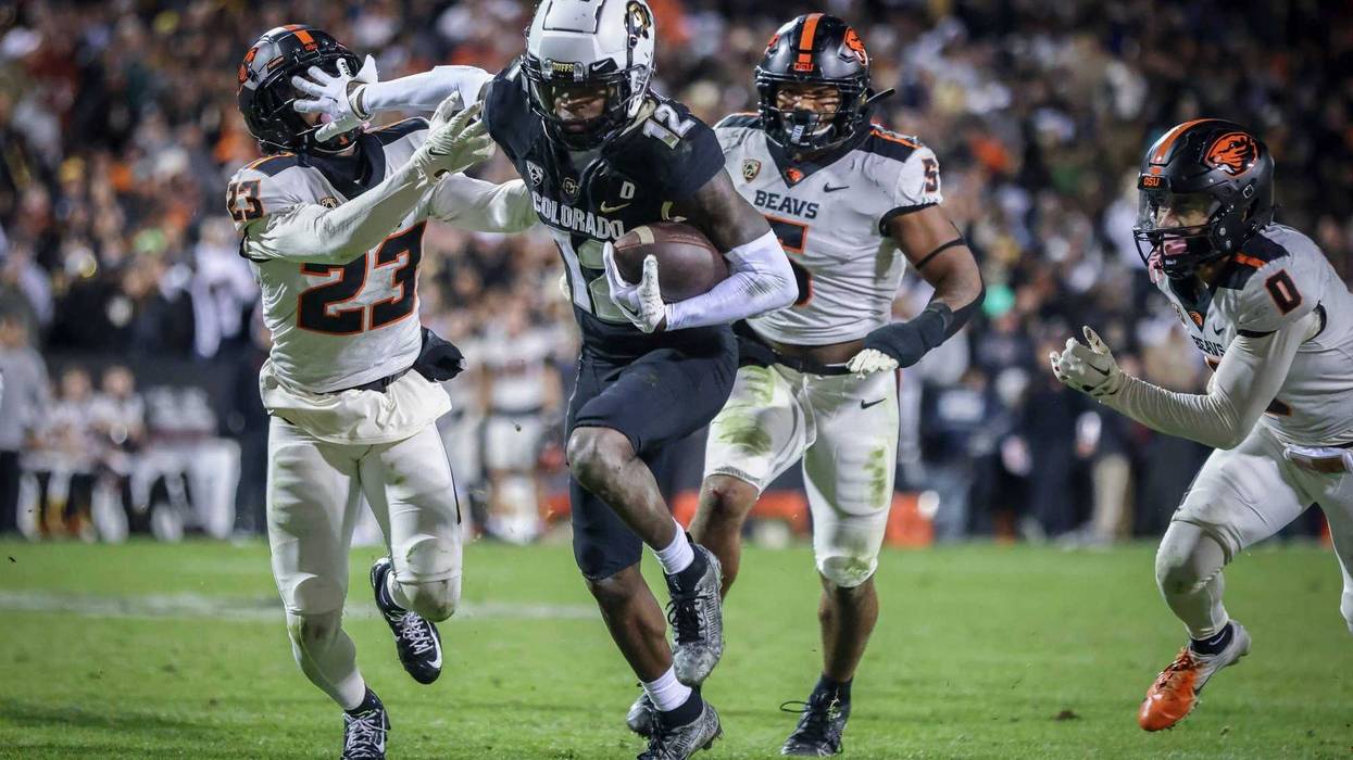 Nov 4, 2023; Boulder, Colorado, USA; Colorado Buffaloes cornerback Travis Hunter (12) breaks past Oregon State Beavers defensive back Jermod McCoy (23) at Folsom Field.