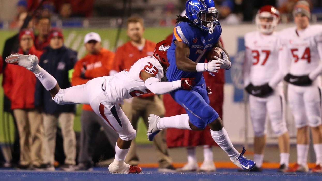 Nov 9, 2018; Boise, ID, USA; Boise State Broncos wide receiver A.J. Richardson (7) carries the ball as Fresno State Bulldogs defensive back Juju Hughes (23) tackles during the first half at Albertsons Stadium. Brian Losness-USA TODAY Sports