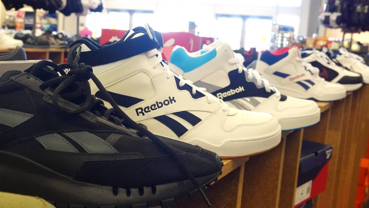 NOVATO, CALIFORNIA - MARCH 17: Reebok shoes are displayed at a Designer Shoe Warehouse store on March 17, 2022 in Novato, California. As many American companies have halted business in Russia due to the Russian invasion of Ukraine, some companies are opting to continue their business in the country. Well known brands like Reebok, Eddie Bauer, and the makers of Brawny paper towels and Vanity Fair napkins are still selling their products and doing business in Russia.