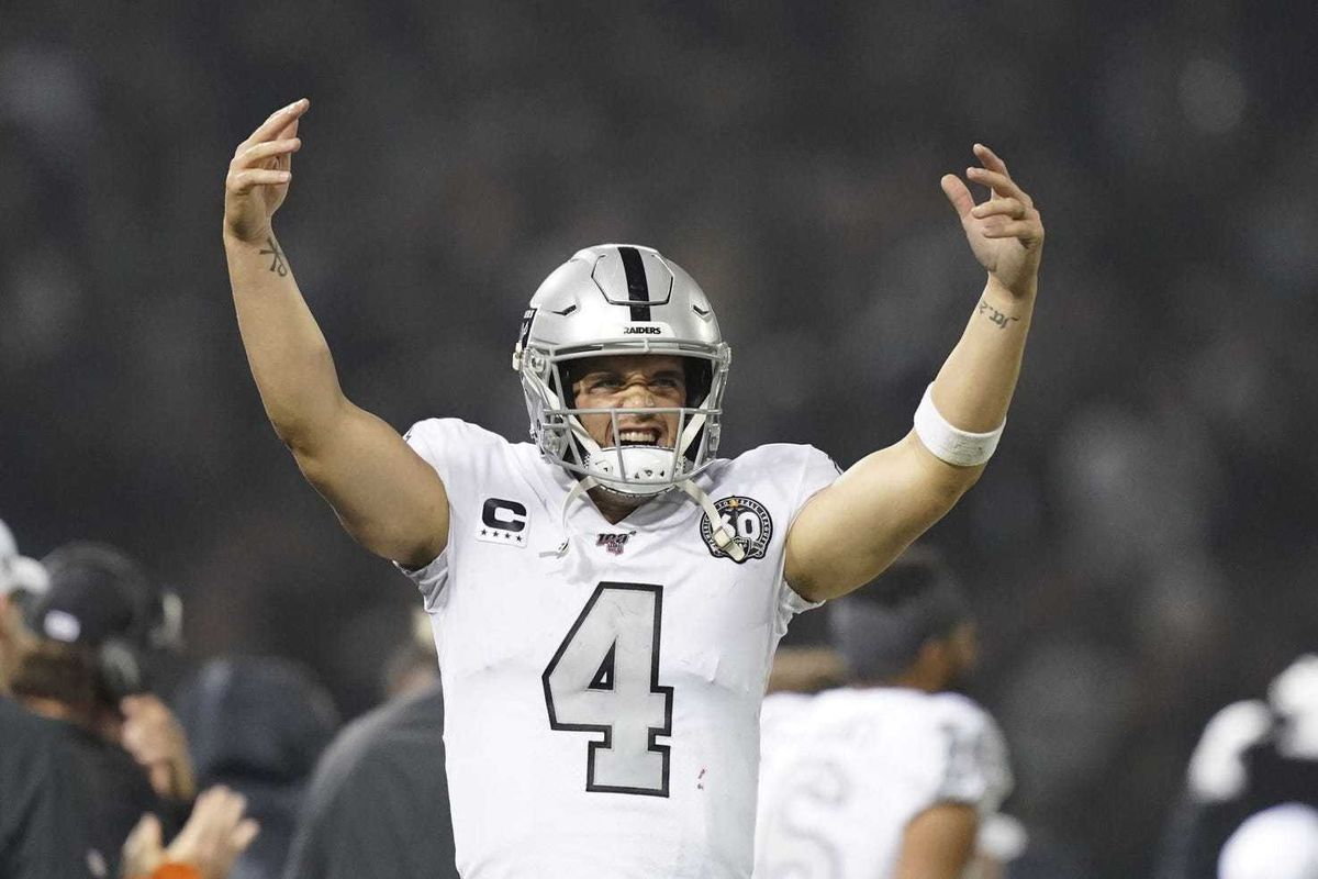 November 7, 2019; Oakland, CA, USA; Oakland Raiders quarterback Derek Carr (4) interacts with the fans during the fourth quarter against the Los Angeles Chargers at Oakland Coliseum. Mandatory Credit: Kyle Terada-USA TODAY Sports