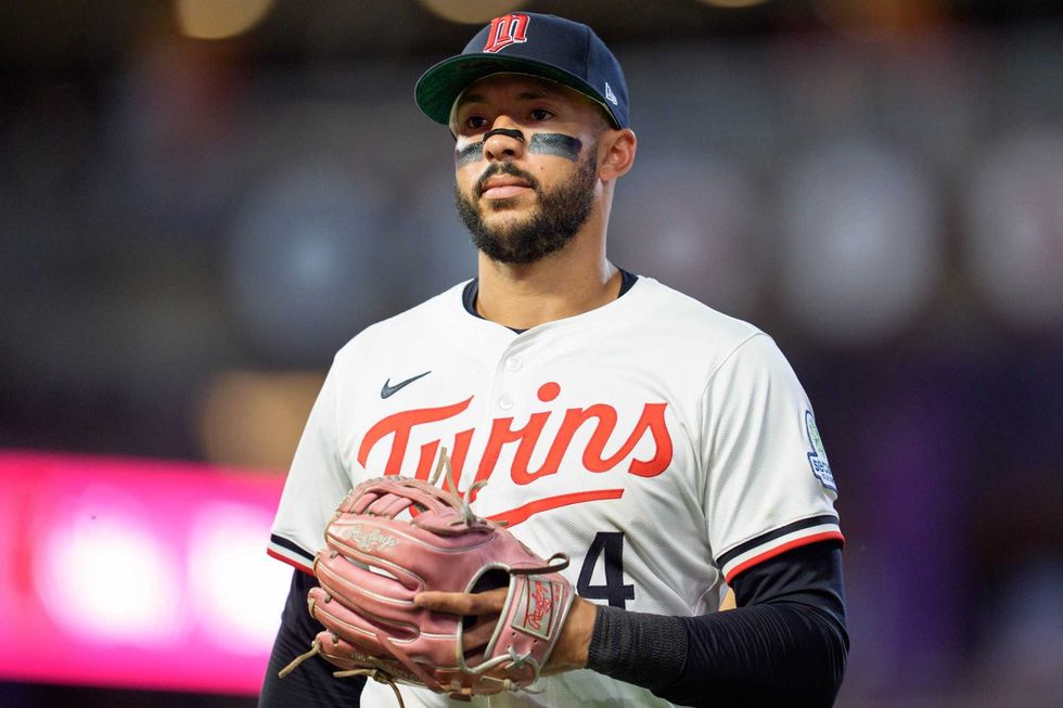 Now former Minnesota Twins shortstop Carlos Correa (4) walks to the dugout after the ninth inning against the Washington Nationals at Target Field.