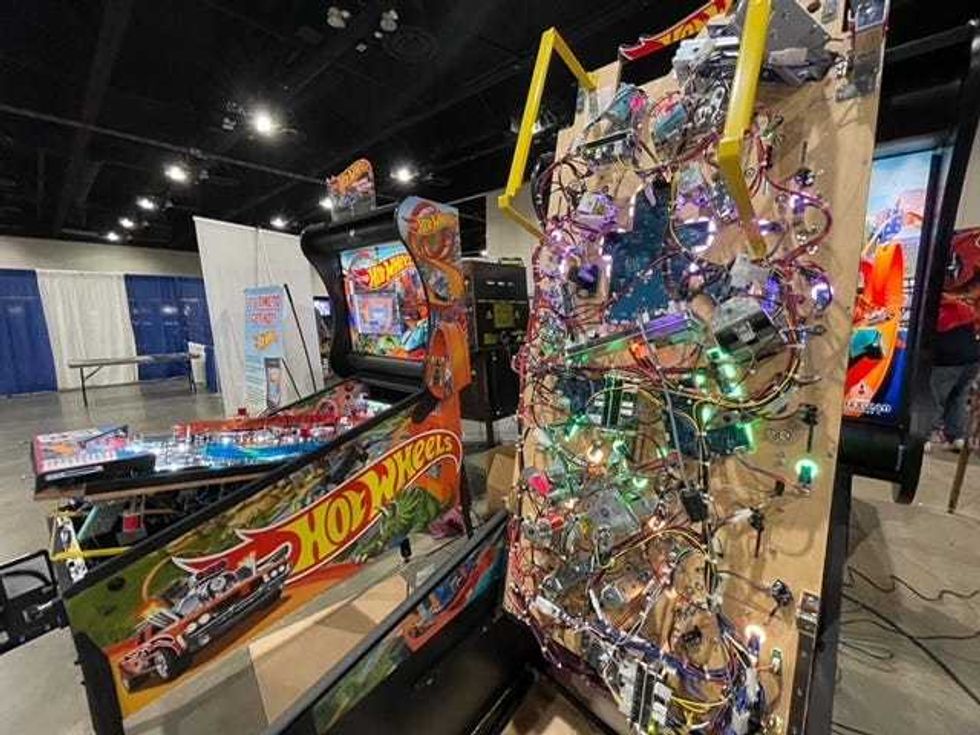 Now, with the help of technology, the traditional pinball game is a much more sophisticated machine, complete with touch screens, computers, sound effects, and rock music.