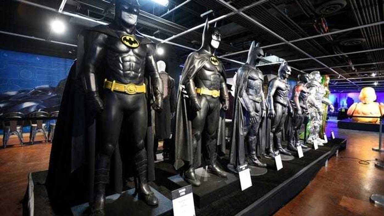 Numerous Batman props, costumes and memorabilia are on display at The Batman Experience Powered by AT&T.