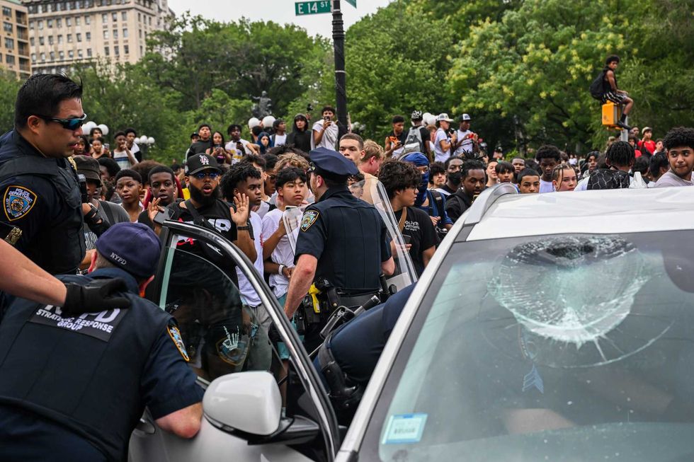 Numerous cars were damaged around Union Square during the riot on Aug. 4, 2023
