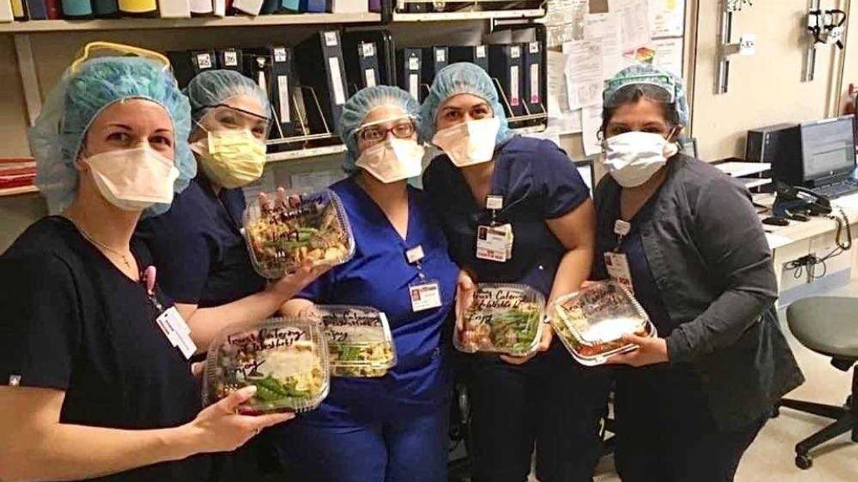 nurses holding salads