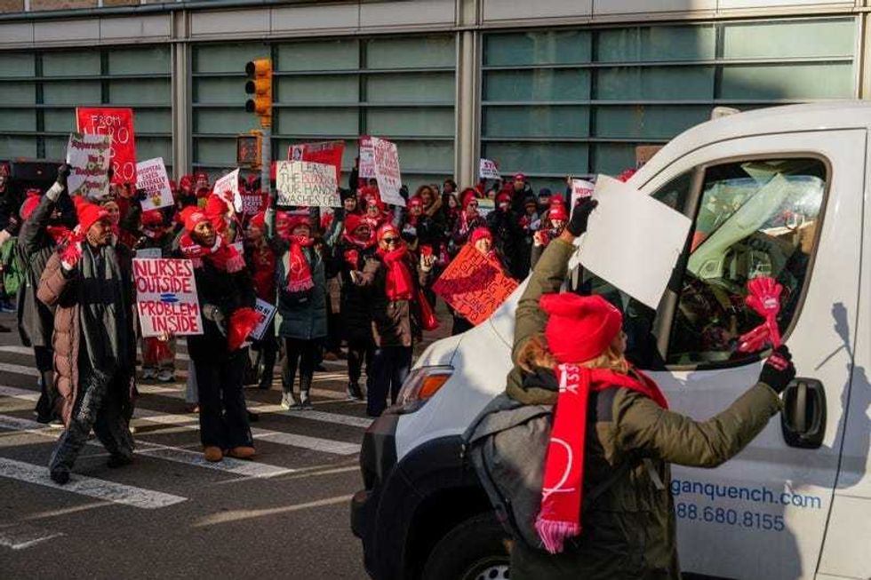 Nurses strike outside New York-Presbyterian Hospital, Monday, Jan. 12, 2026, in New York