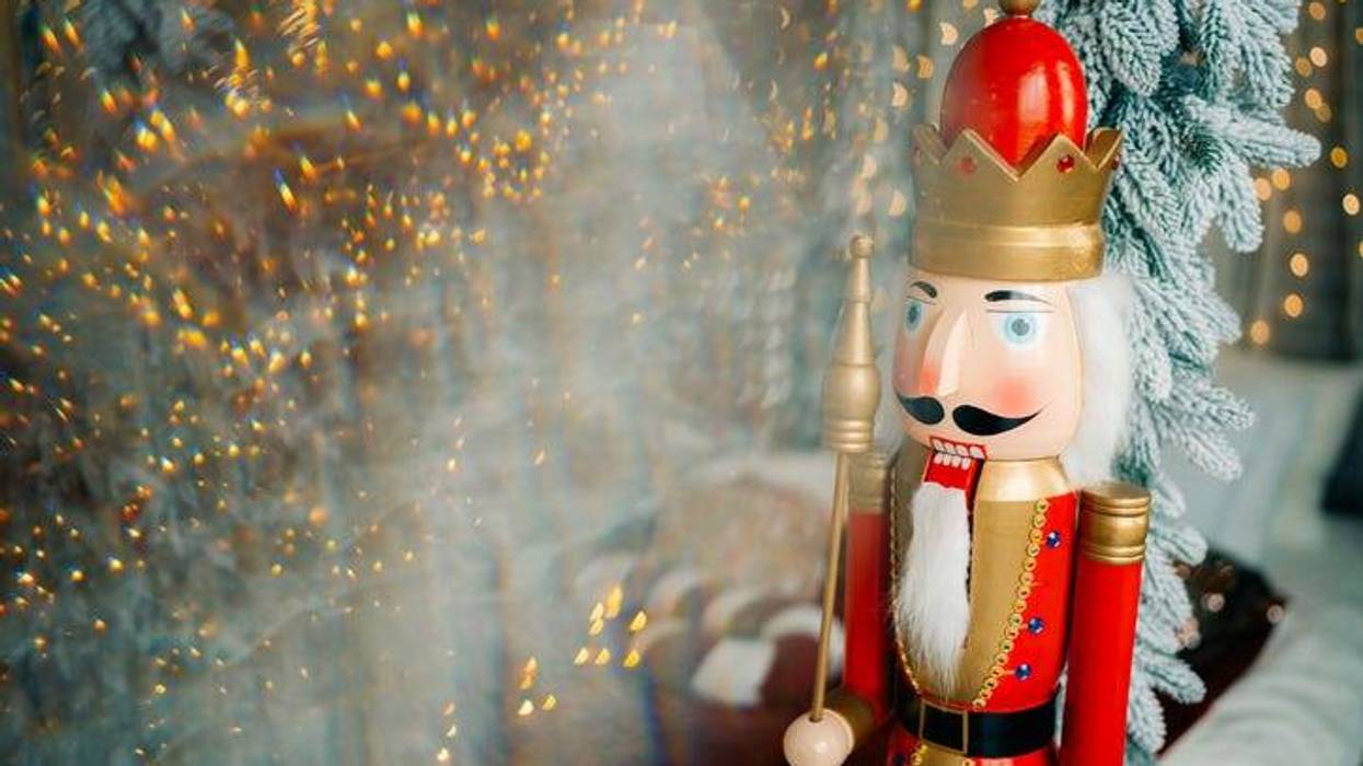 Nutcracker doll in a decorated New Year's room