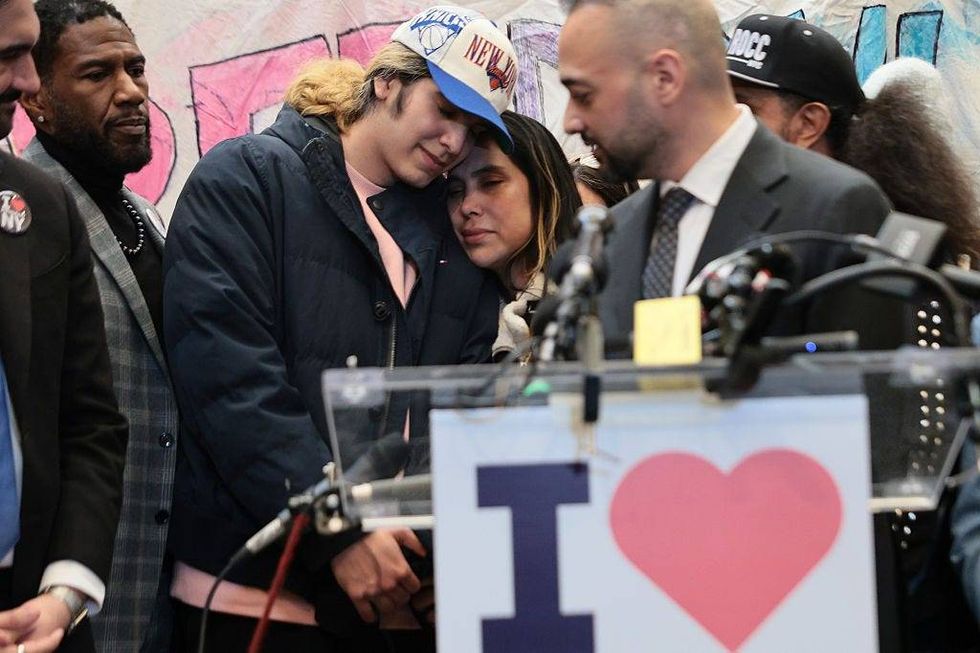 NYC High School student Dylan Lopez Contreras and his mother Raiza Contreras embrace during a press conference on his release at Middle Church on March 19, 2026 in New York City.
