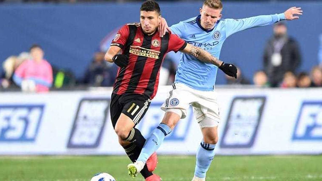 NYCFC midfielder Alexander Ring attempts to steal the ball from Atlanta United midfielder Eric Remedi on Nov. 4, 2018, at Yankee Stadium.