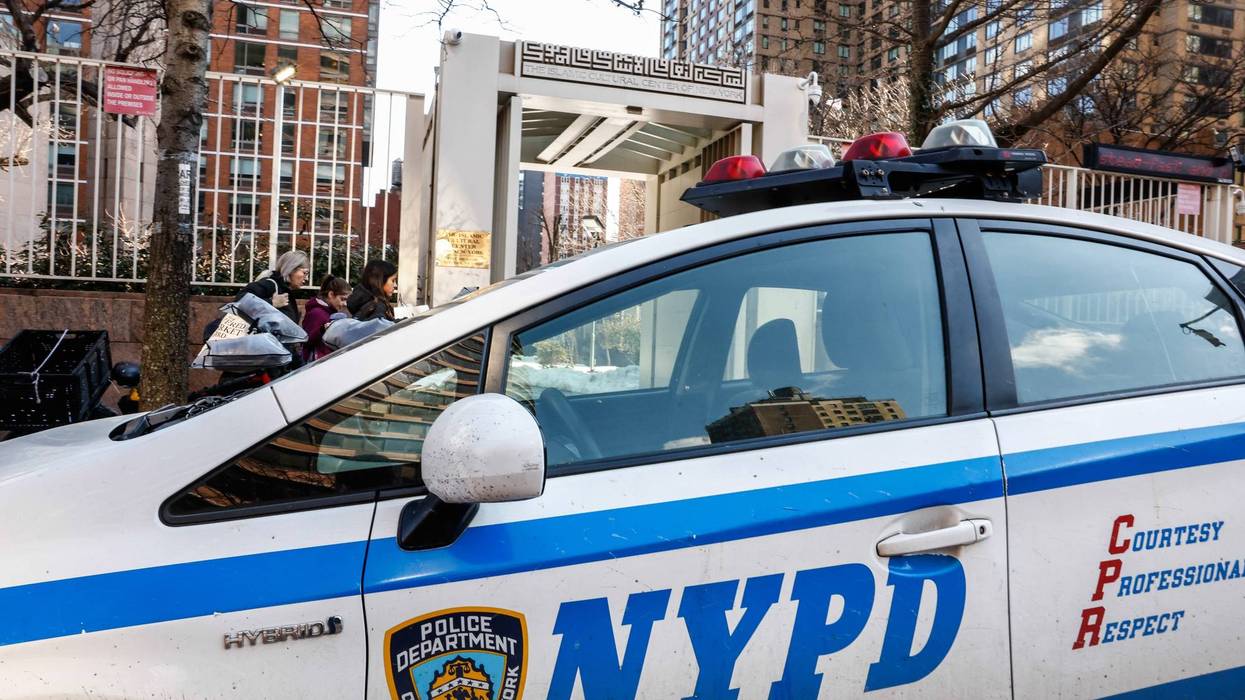 NYPD cars are seen outside the Islamic Cultural Center of New York, Saturday, Feb. 28, 2026, in New York.