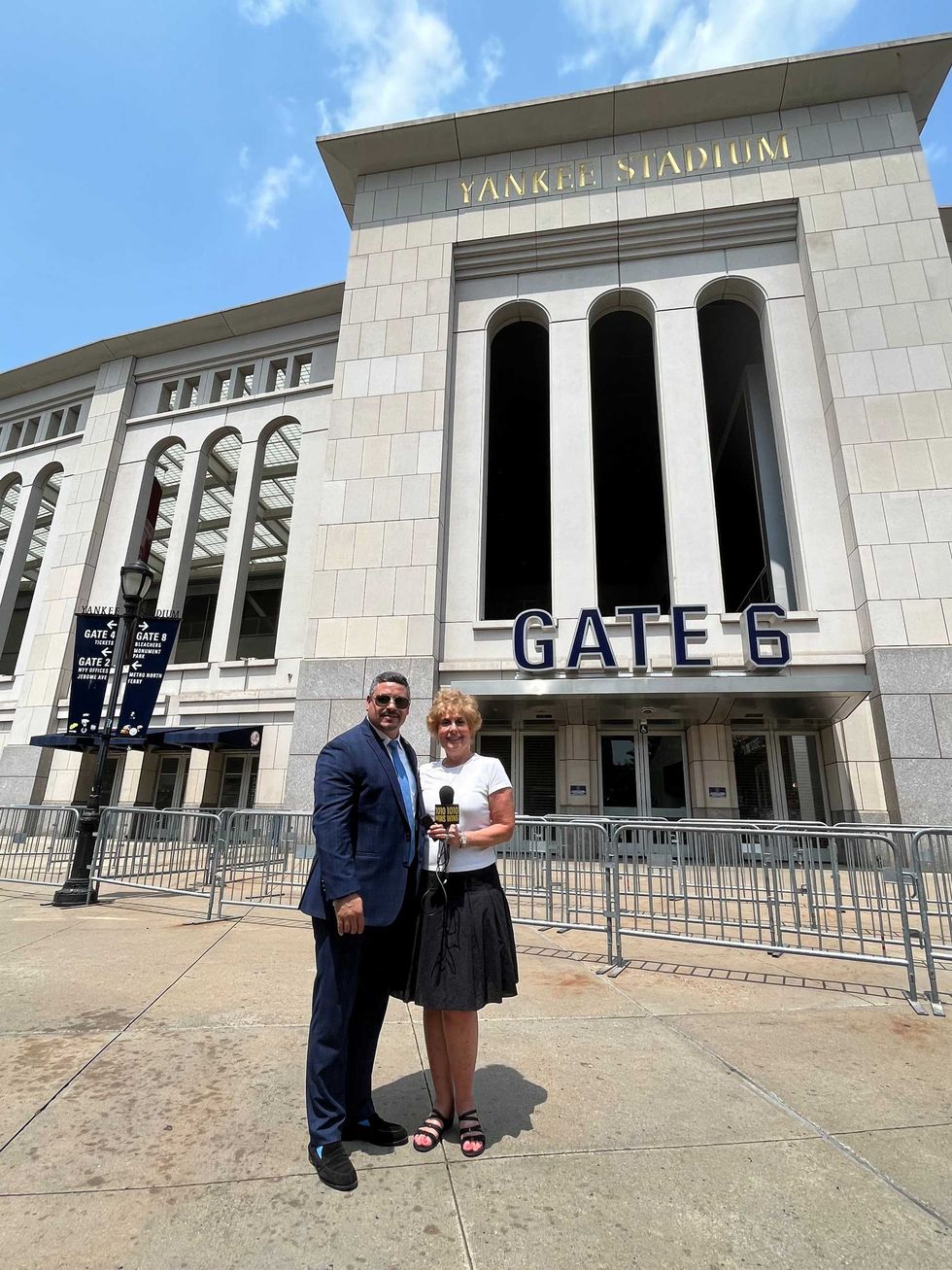 NYPD commissioner Edward Caban and 1010 WINS reporter Juliet Papa