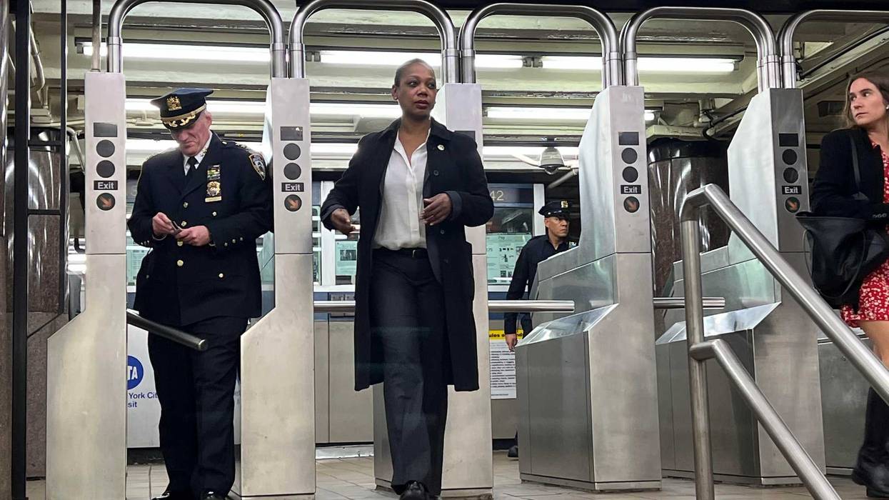 NYPD Commissioner Keechant Sewell enters the subway system at the Lexington Avenue/51st Street station in Midtown with NYPD Transit Chief Jason Wilcox