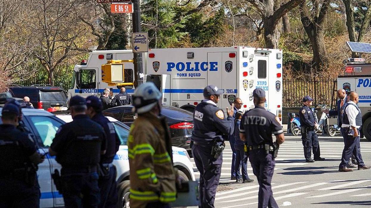 NYPD Counterterrorism officers respond to a suspicious package report in Carl Schurz Park, which borders Gracie Mansion, on March 10, 2026 in New York City.