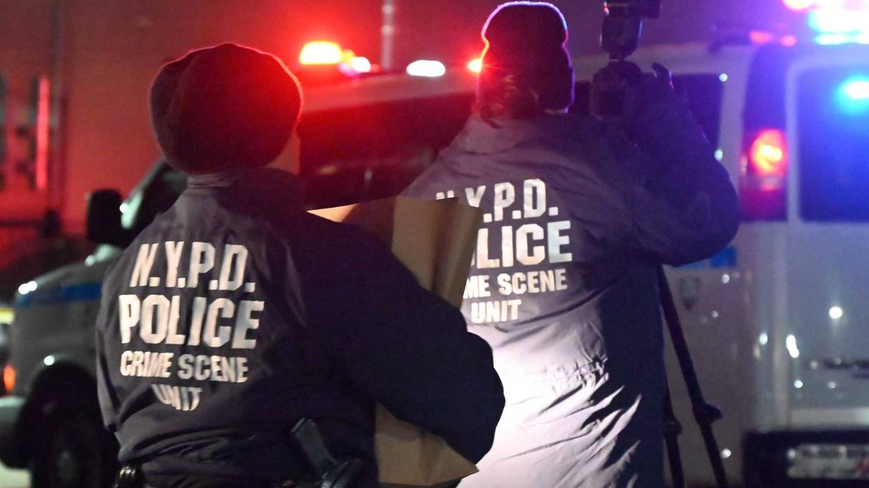 NYPD investigators at a crime scene in the Bronx