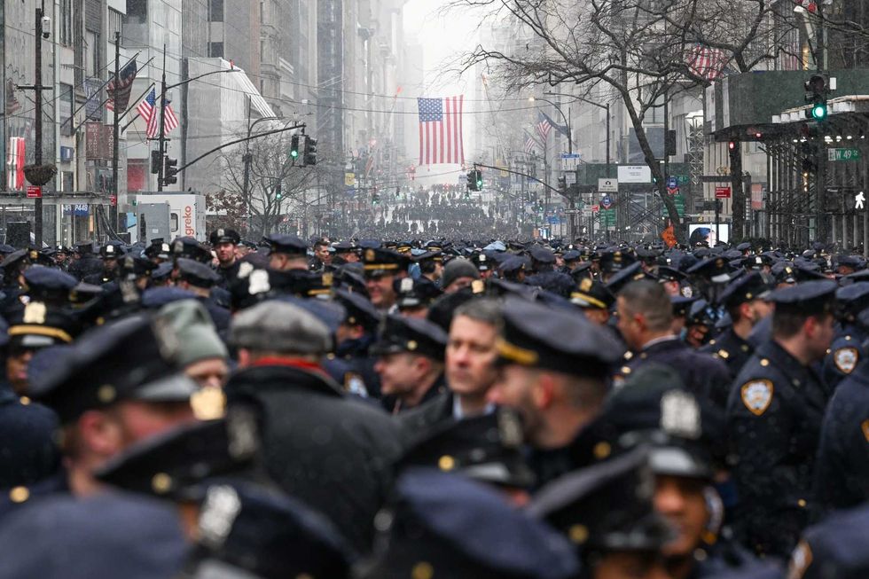 NYPD officers and other law enforcement members gather at the funeral of Officer Jason Rivera at St. Patrick
