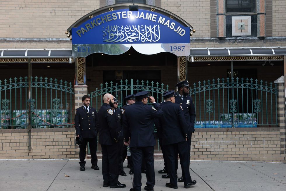 NYPD officers await the start of the funeral of slain NYPD officer Didarul Islam at Parkchester Jame Masjid on July 31, 2025