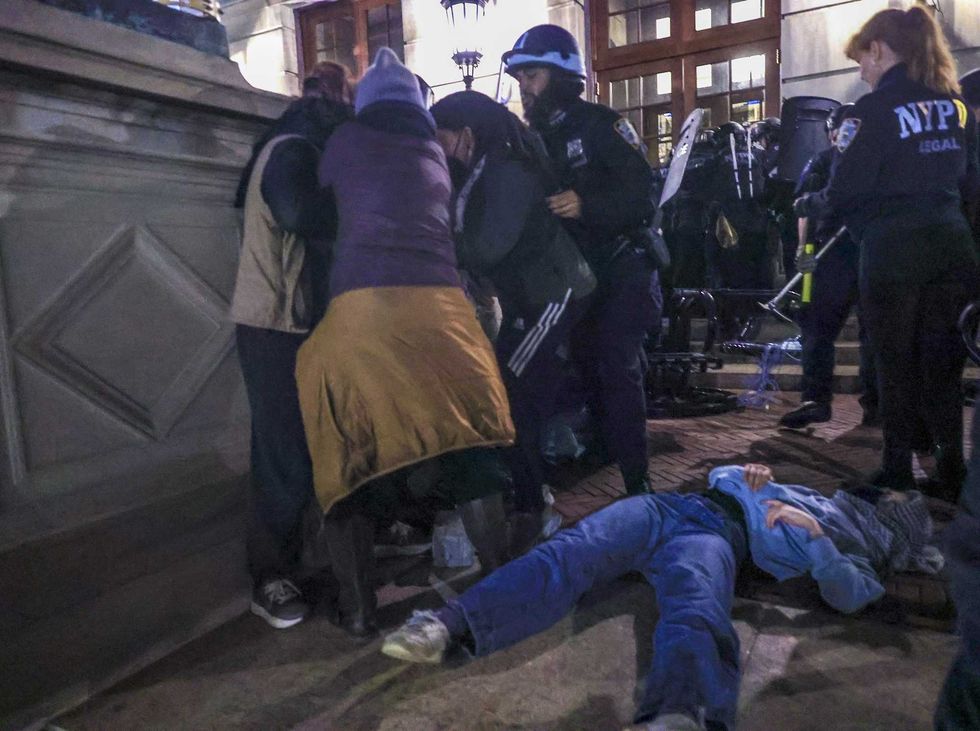 NYPD officers detain dozens of pro-Palestinian students at Columbia University on April 30, 2024
