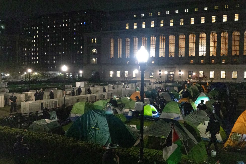 NYPD officers in riot gear enter Columbia University