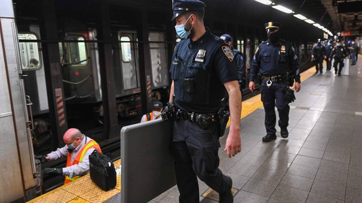 NYPD officers investigating a different incident in the subway -- not the shooting on Friday.