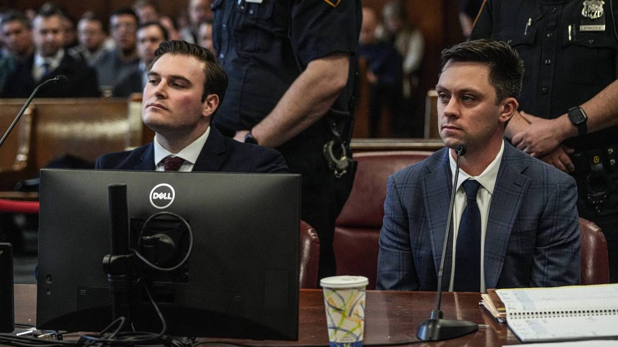 NYPD officers Michael Caligiuri, 31, and Ryan McLoughlin, 30, were arraigned on Friday for allegedly covering up a drunk driving crash involving another officer.