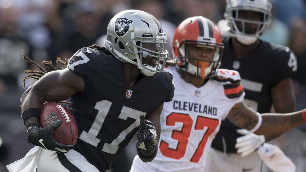 Oakland Raiders wide receiver Dwayne Harris (17) runs against Cleveland Browns defensive back Denzel Rice (37) during the fourth quarter at Oakland Coliseum.