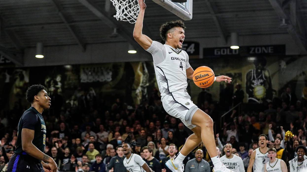 Oakland's Trey Townsend dunks