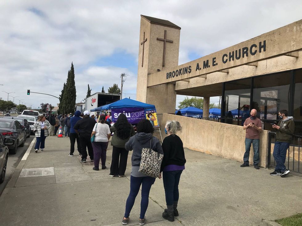 Oaklanders gather at the Brookins AME Church in East Oakland to get their COVID-19 vaccine.