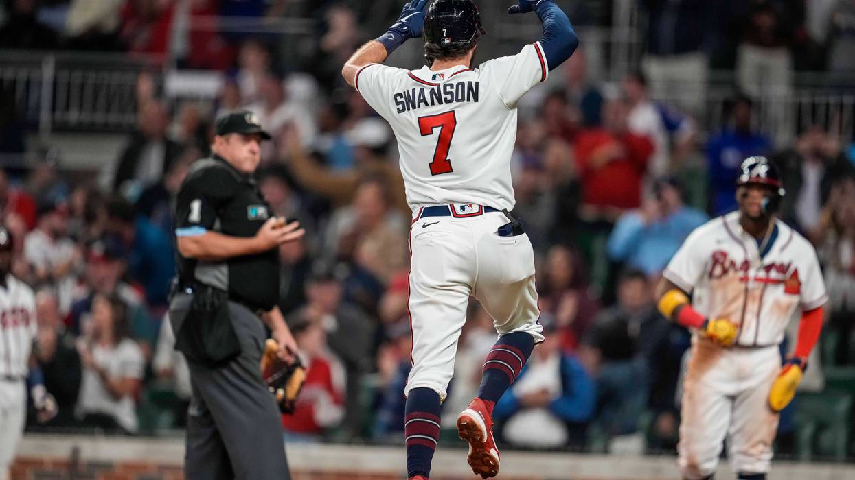 Oct 1, 2022; Cumberland, Georgia, USA; Atlanta Braves shortstop Dansby Swanson (7) reacts after hitting a home run against the New York Mets during the fifth inning at Truist Park. Mandatory Credit: Dale Zanine-USA TODAY Sports