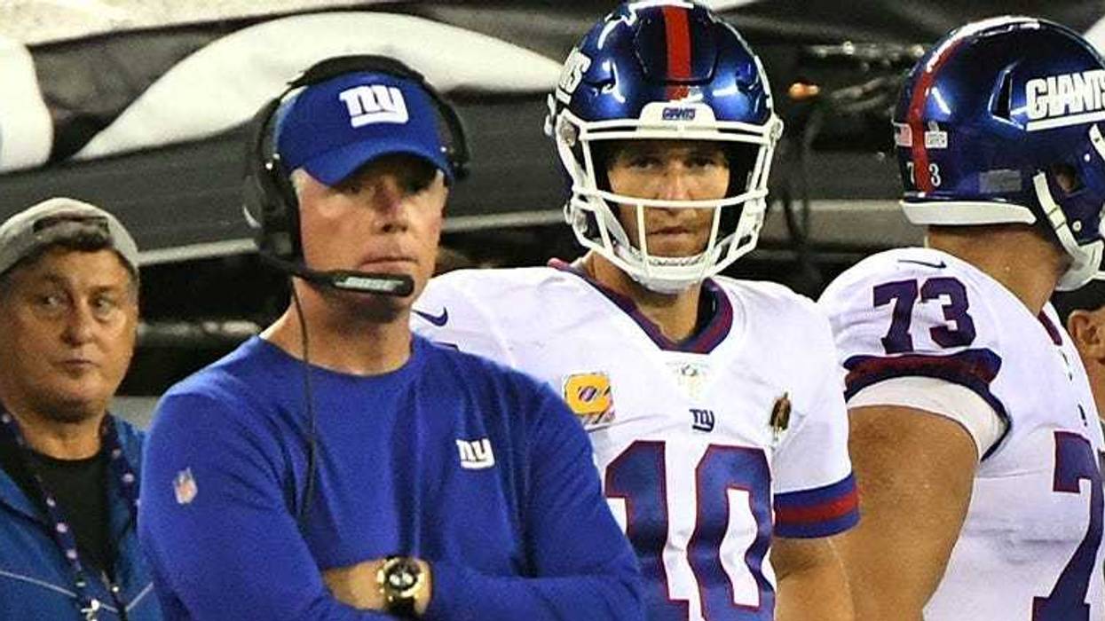 Oct 11, 2018; East Rutherford, NJ, USA; New York Giants head coach Pat Shurmur and Giants quarterback Eli Manning (10) look on late in the fourth quarter against the Philadelphia Eagles at MetLife Stadium. Mandatory Credit: Robert Deutsch-USA TODAY Sports