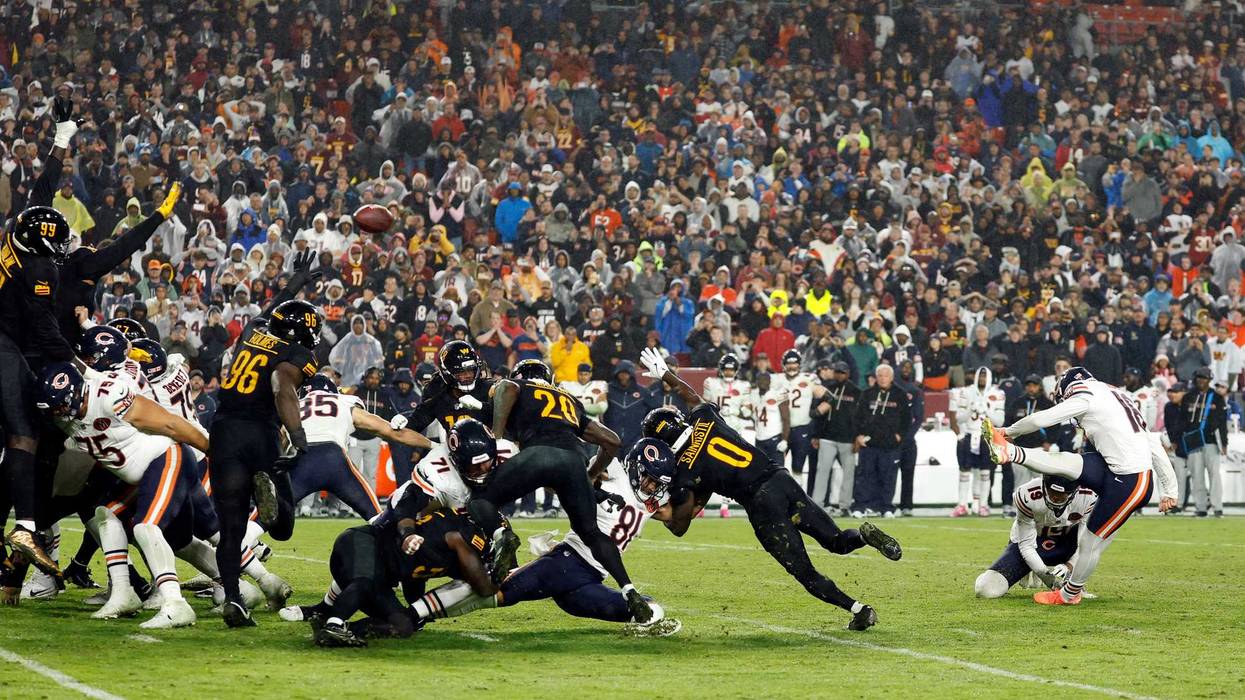 Oct 13, 2025; Landover, Maryland, USA; Chicago Bears kicker Jake Moody (16) kicks a game-winning field goal against the Washington Commanders during the fourth quarter at Northwest Stadium. Mandatory Credit: Geoff Burke-Imagn Images