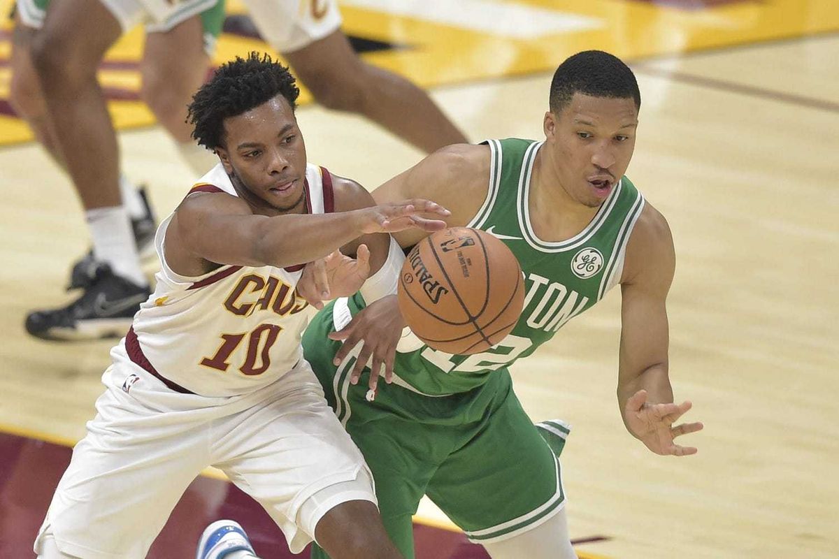 Oct 15, 2019; Cleveland, OH, USA; Boston Celtics forward Grant Williams (12) knocks the ball from Cleveland Cavaliers guard Darius Garland (10) in the third quarter at Rocket Mortgage FieldHouse. Mandatory Credit: David Richard-USA TODAY Sports