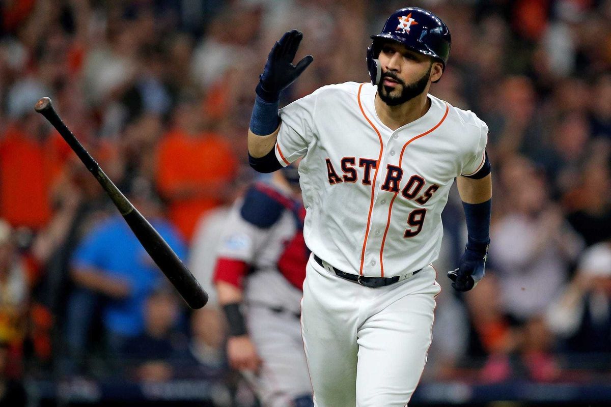 Oct 16, 2018; Houston, TX, USA; Houston Astros left fielder Marwin Gonzalez (9) flips his bat after singling in a run in the first inning against the Boston Red Sox in game three of the 2018 ALCS playoff baseball series at Minute Maid Park. Mandatory Cred