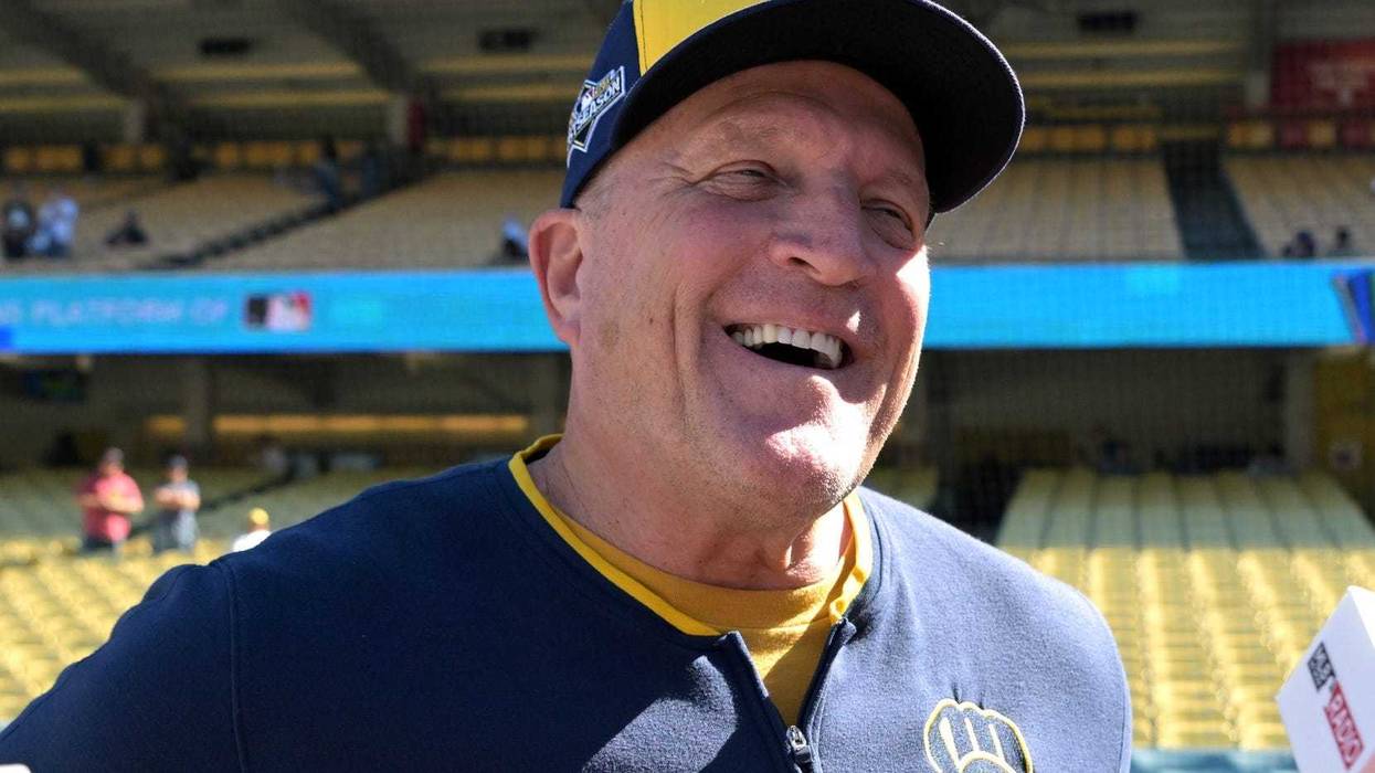 Oct 16, 2025; Los Angeles, California, USA; Milwaukee Brewers manager Pat Murphy (49) speaks to media on the field before game three against the Los Angeles Dodgers in the NLCS round for the 2025 MLB playoffs at Dodger Stadium. Mandatory Credit: Jayne Kamin-Oncea-Imagn Images