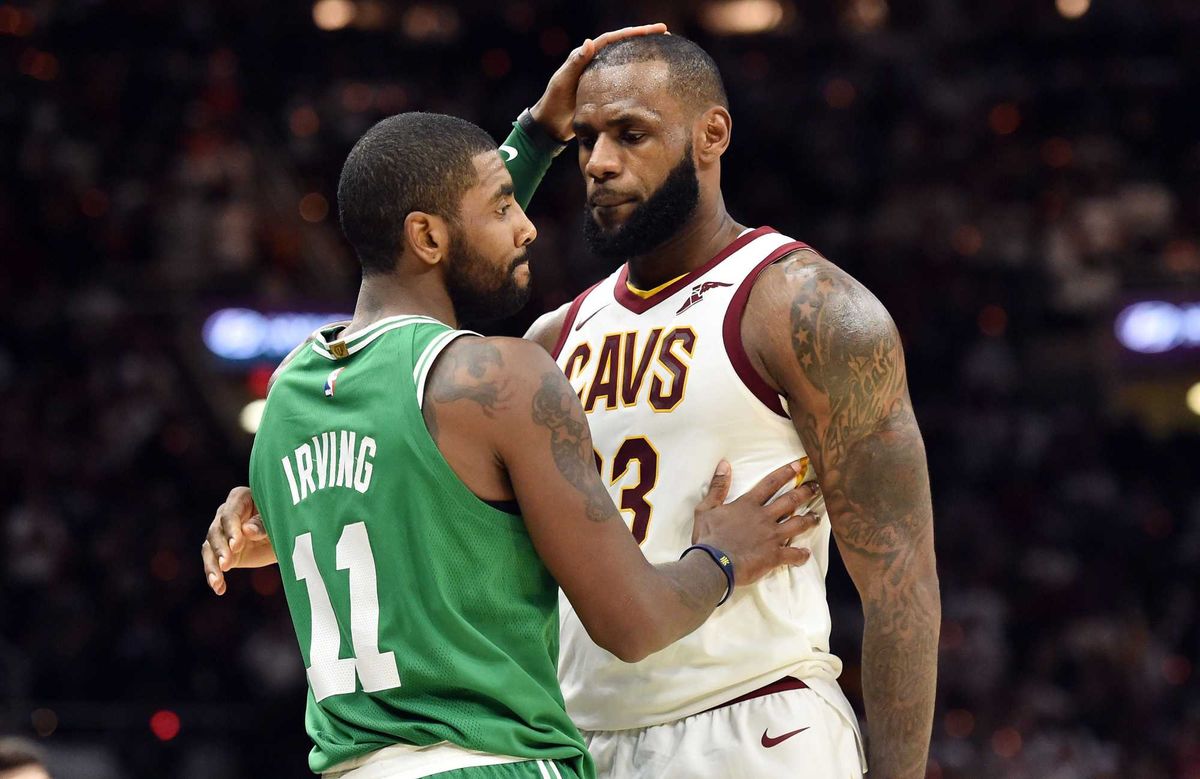 Oct 17, 2017; Cleveland, OH, USA; Cleveland Cavaliers forward LeBron James (23) and Boston Celtics guard Kyrie Irving (11) meet after the Cavs beat the Celtics 102-99 at Quicken Loans Arena. Mandatory Credit: Ken Blaze-USA TODAY Sports