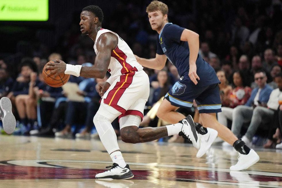Oct 17, 2025; Miami, Florida, USA; Miami Heat guard Terry Rozier (2) brings the ball up the court against the Memphis Grizzlies during the second half at Kaseya Center.