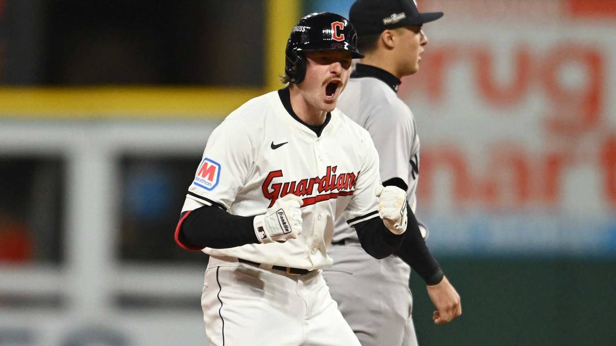 Oct 18, 2024; Cleveland, Ohio, USA; Cleveland Guardians first base Kyle Manzardo (9) celebrates at second base after hitting a double against the New York Yankees in the first inning during game four of the ALCS for the 2024 MLB playoffs at Progressive Field.