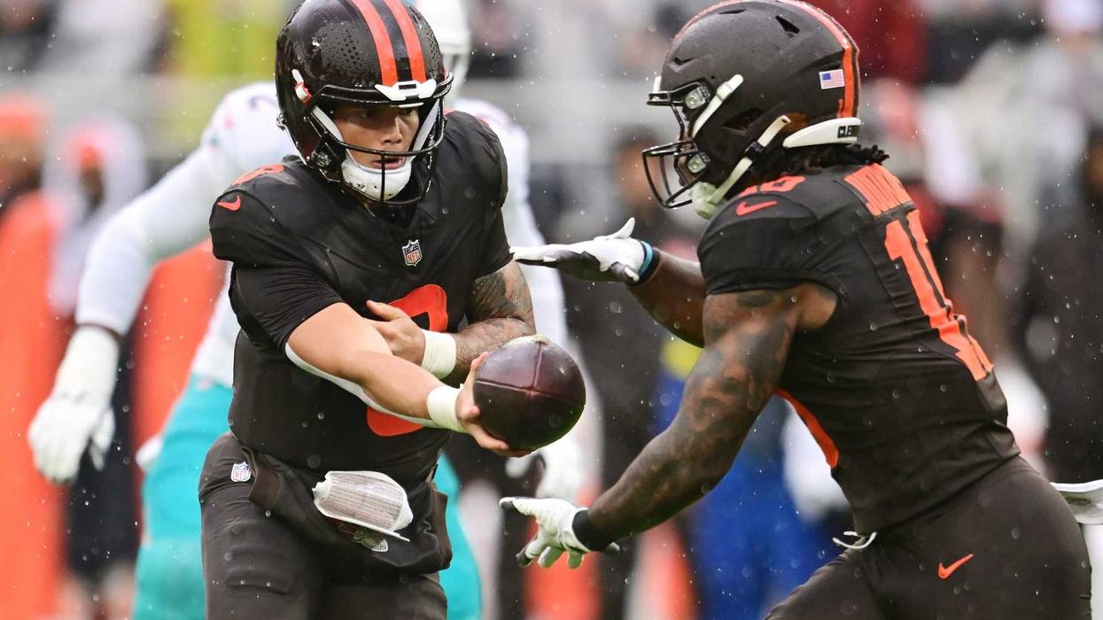 Oct 19, 2025; Cleveland, Ohio, USA; Cleveland Browns quarterback Dillon Gabriel (8) hands off to running back Quinshon Judkins (10) against the Miami Dolphins during the first quarter at Huntington Bank Field.