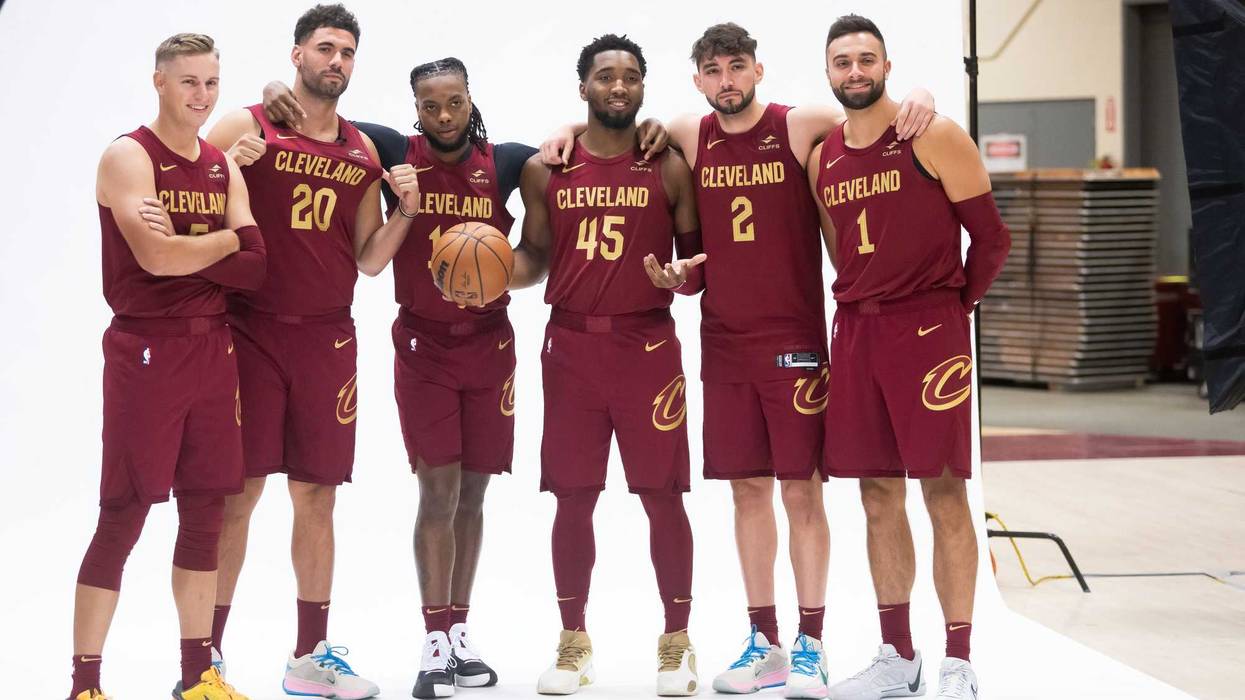 Oct 2, 2023; Cleveland, OH, USA; Cleveland Cavaliers guard Sam Merrill (5) and forward Georges Niang (20) and guard Darius Garland (10) and guard Donovan Mitchell (45) and guard Ty Jerome (2) and guard Max Strus (1) pose for a photo during media day at Rocket Mortgage FieldHouse. Mandatory Credit: Ken Blaze-USA TODAY Sports