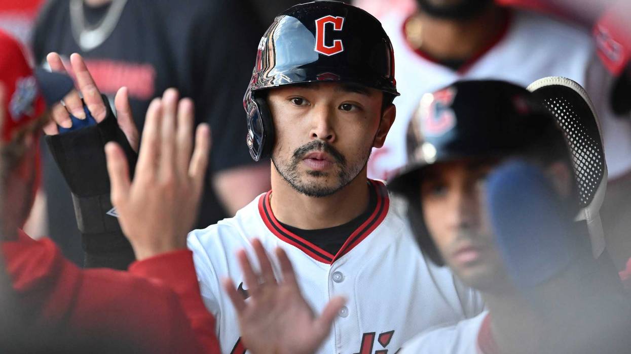 Oct 2, 2025; Cleveland, Ohio, USA; Cleveland Guardians outfielder Steven Kwan (38) celebrates with teammates after scoring in the eighth inning against the Detroit Tigers during game three of the Wildcard round for the 2025 MLB playoffs at Progressive Field.