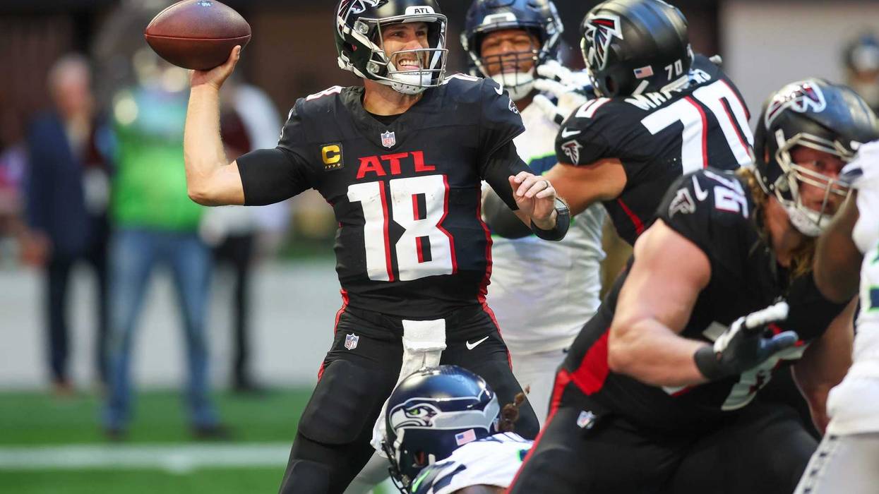 Oct 20, 2024; Atlanta, Georgia, USA; Atlanta Falcons quarterback Kirk Cousins (18) throws a pass against the Seattle Seahawks in the fourth quarter at Mercedes-Benz Stadium
